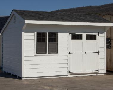 10x14 White Cottage style storage shed with shiplap siding for sale at Pine Creek Structures