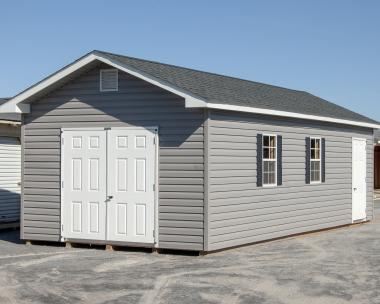 12x28 Front Entry Peak Storage Shed with Vinyl Siding and Roof Overhangs