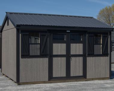 10x14 Peak Storage Shed with New England Package (wide trim, transom windows, etc), driftwood grey LP siding, black trim, and black metal roofing