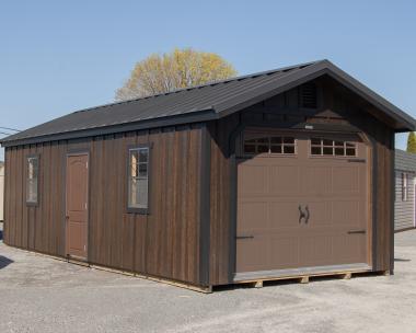 12x28 Peak Roof Garage Building with Ebony LP Board N Batten Siding, Metal roofing, and windows in the overhead door